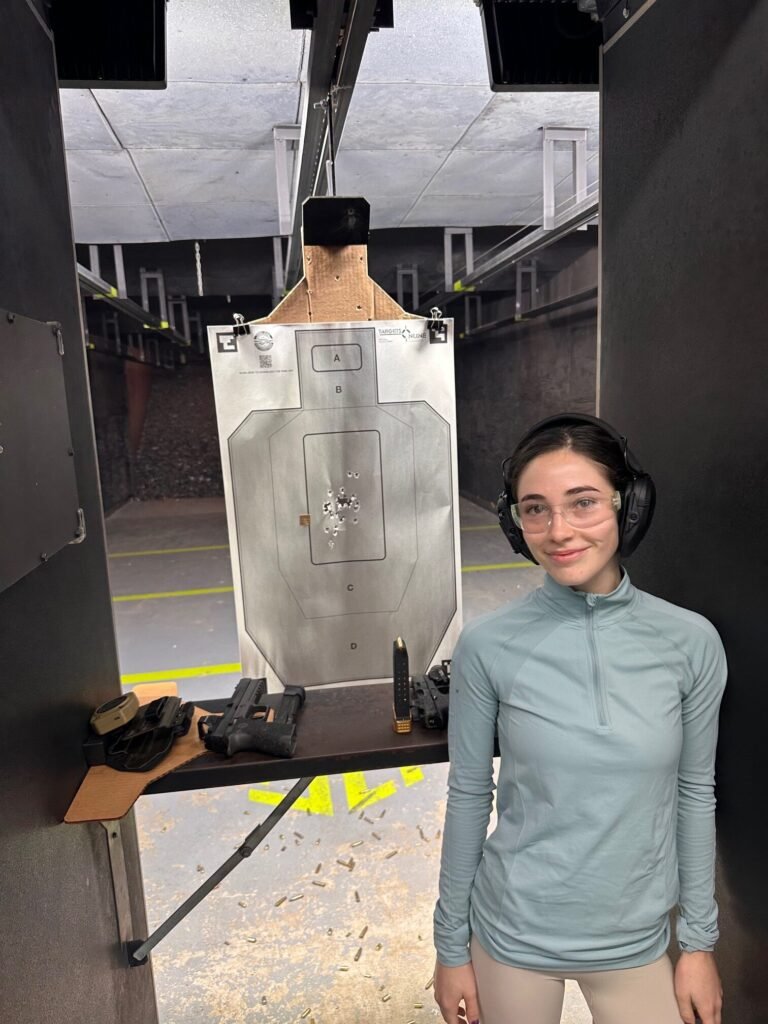 Boca Raton student with her target after a shooting lesson
