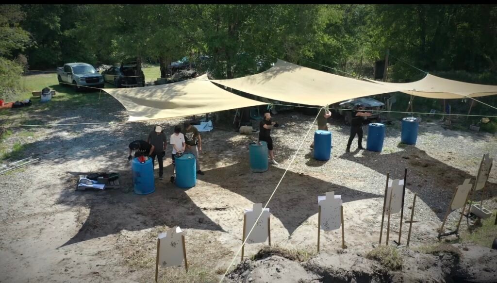 Outdoor shooting range in Boynton Beach with shaded shooting stations