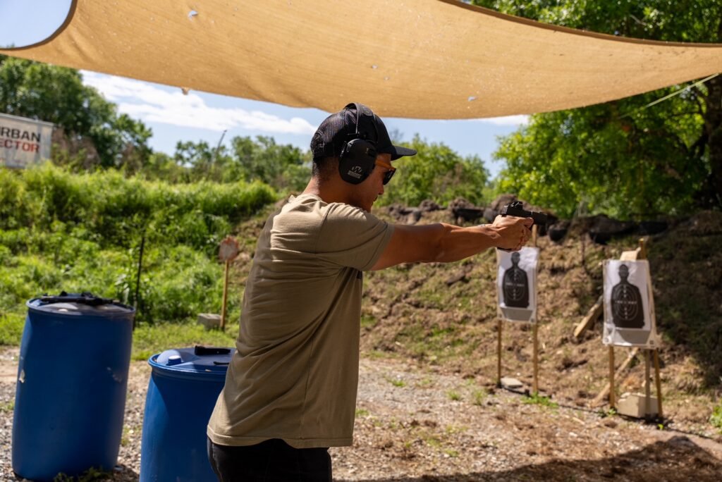 Concealed carry class student practicing at an outdoor range near Delray Beach