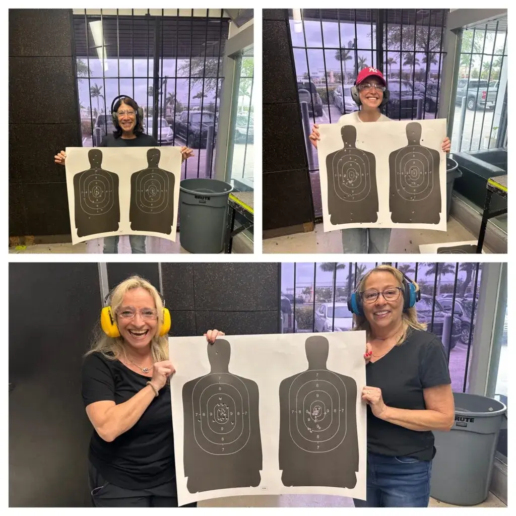 EmpowHER students holding their targets after class