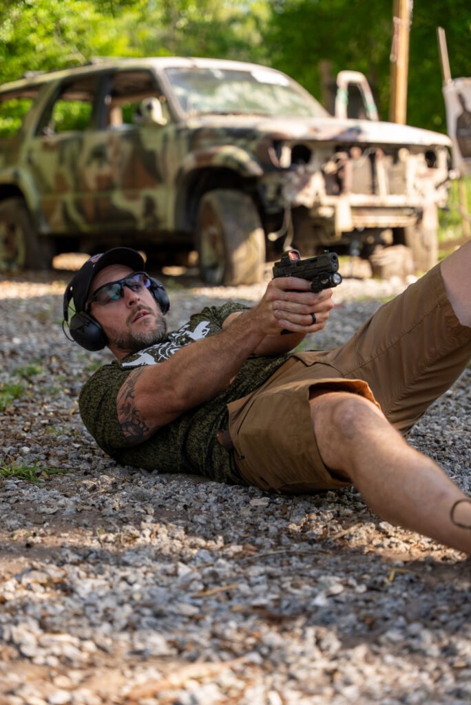 Student shooting from the ground during advanced training