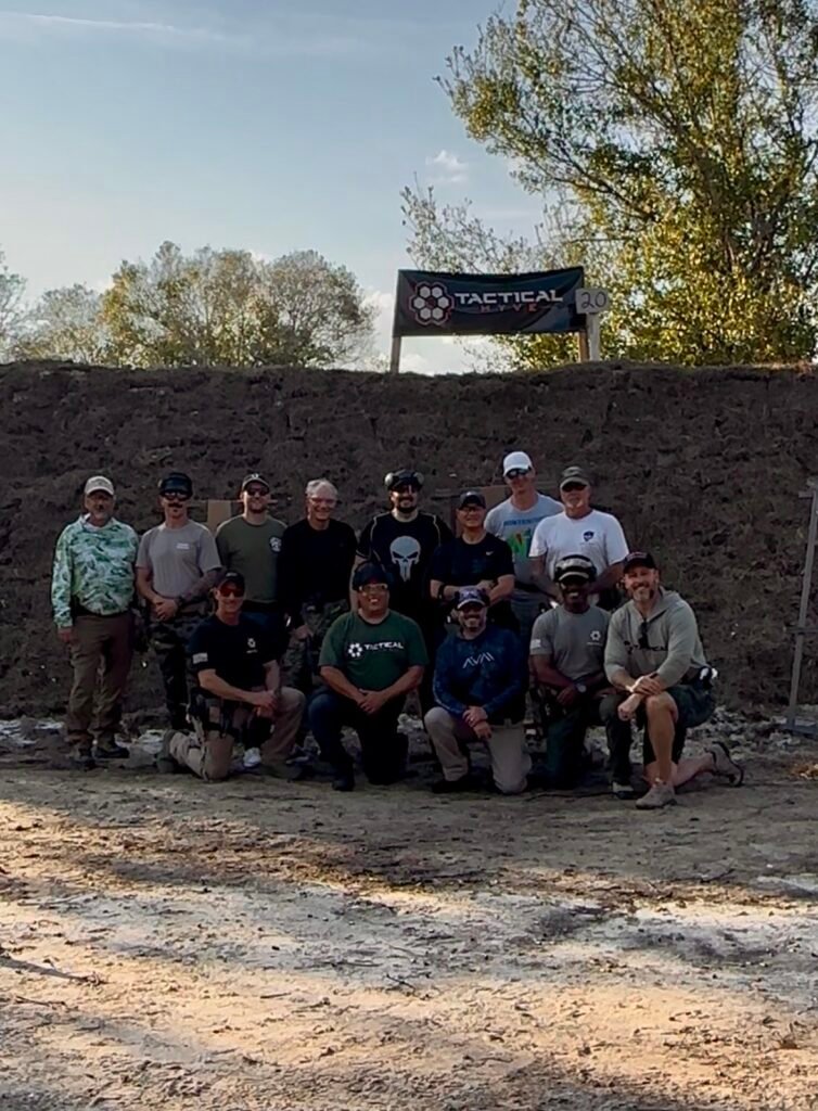 Group firearm class photo at the outdoor range
