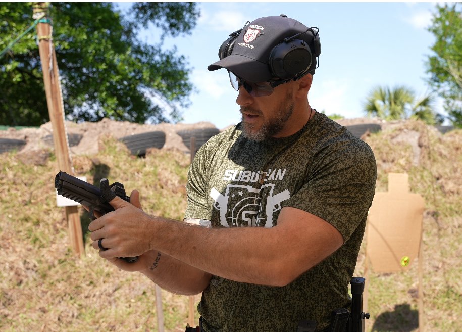 Mike Kneuer demonstrating pistol handling