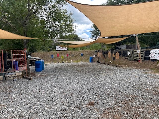 Shaded firing line at the private outdoor range in Boynton Beach