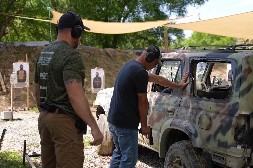 Instructor coaching a vehicle drill in Protector Level 2